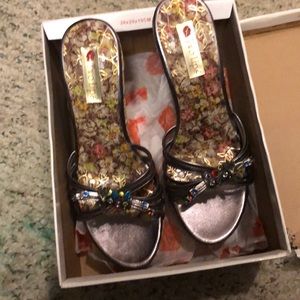 Never worn Metallic Grey size 8.5 5 in wedges